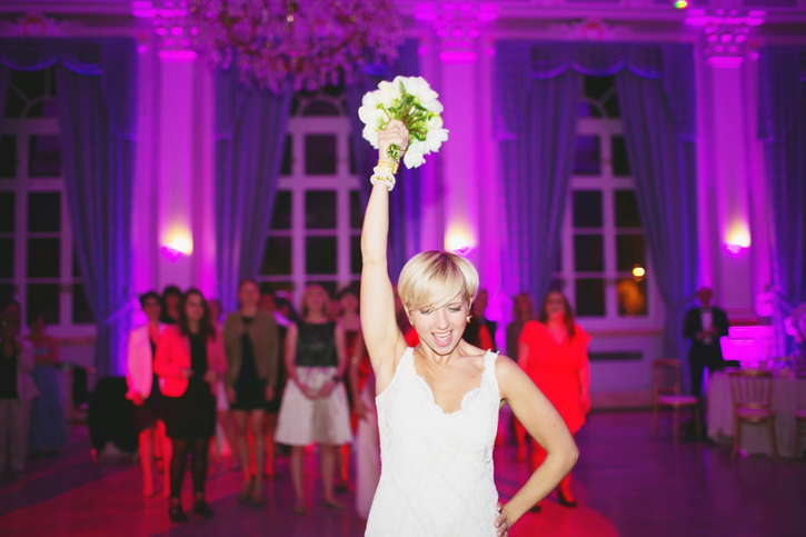 bride throwing her bouquet