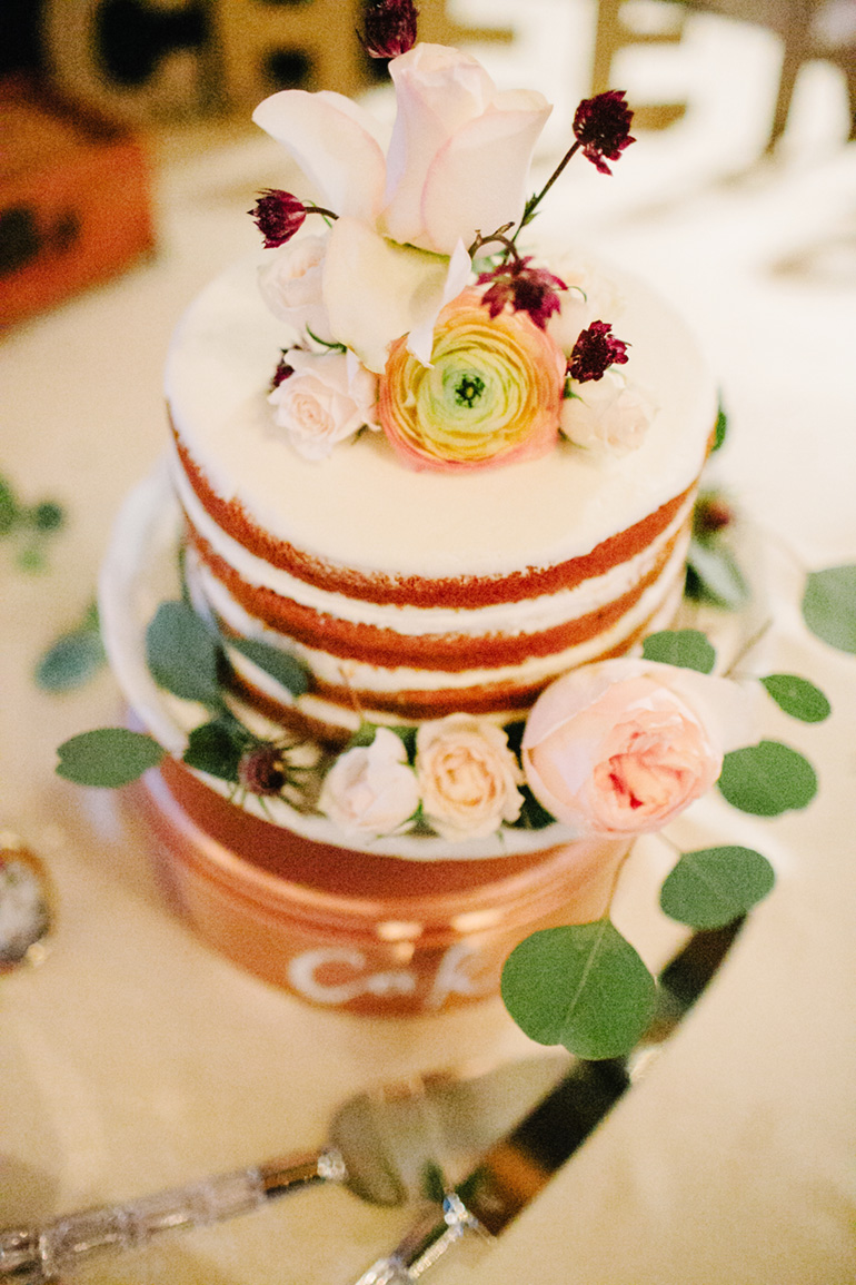 naked wedding cake with flowers