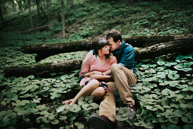couple sitting in the woods