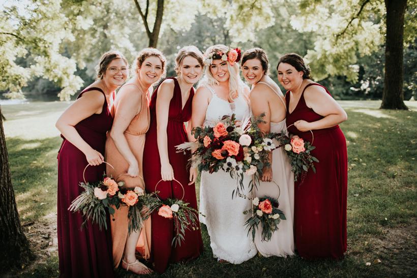 bridesmaids carrying floral hoops by le fleur floral in washington illinois
