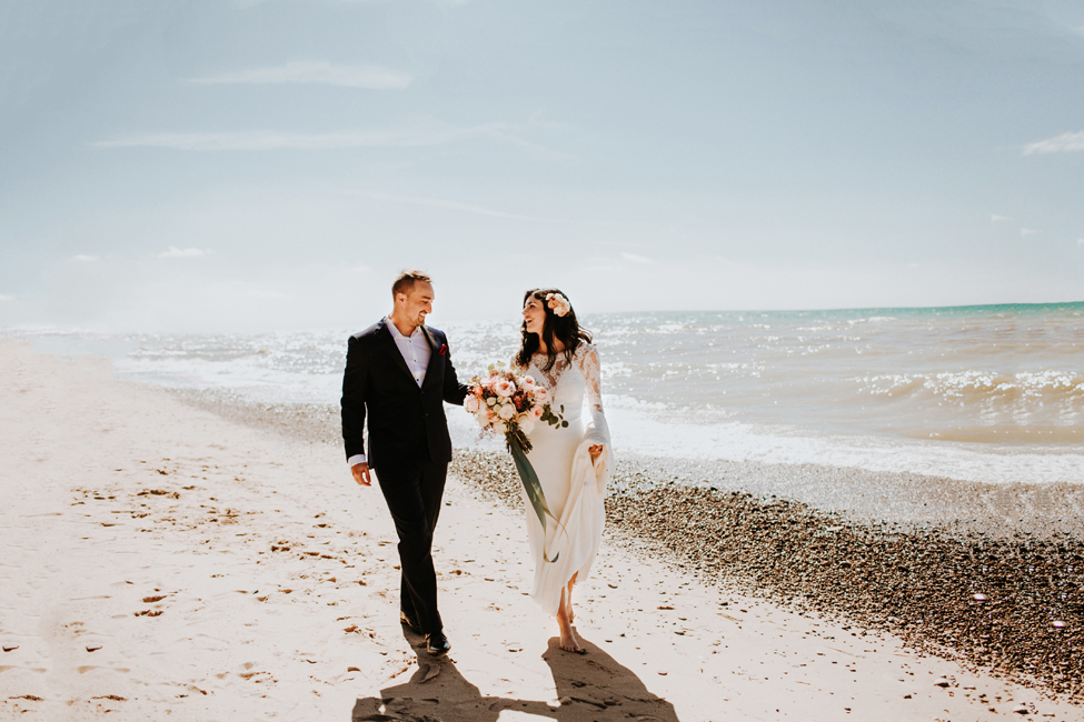 wedding couple on lake michigan beach